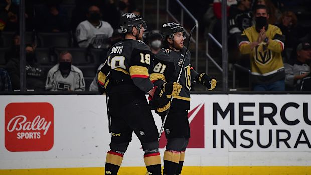 Dec 28, 2021; Los Angeles, California, USA; Vegas Golden Knights center Jonathan Marchessault (81) celebrates with right wing Reilly Smith (19) his goal scored against the Los Angeles Kings during the third period at Crypto.com Arena. Mandatory Credit: Gary A. Vasquez-USA TODAY Sports